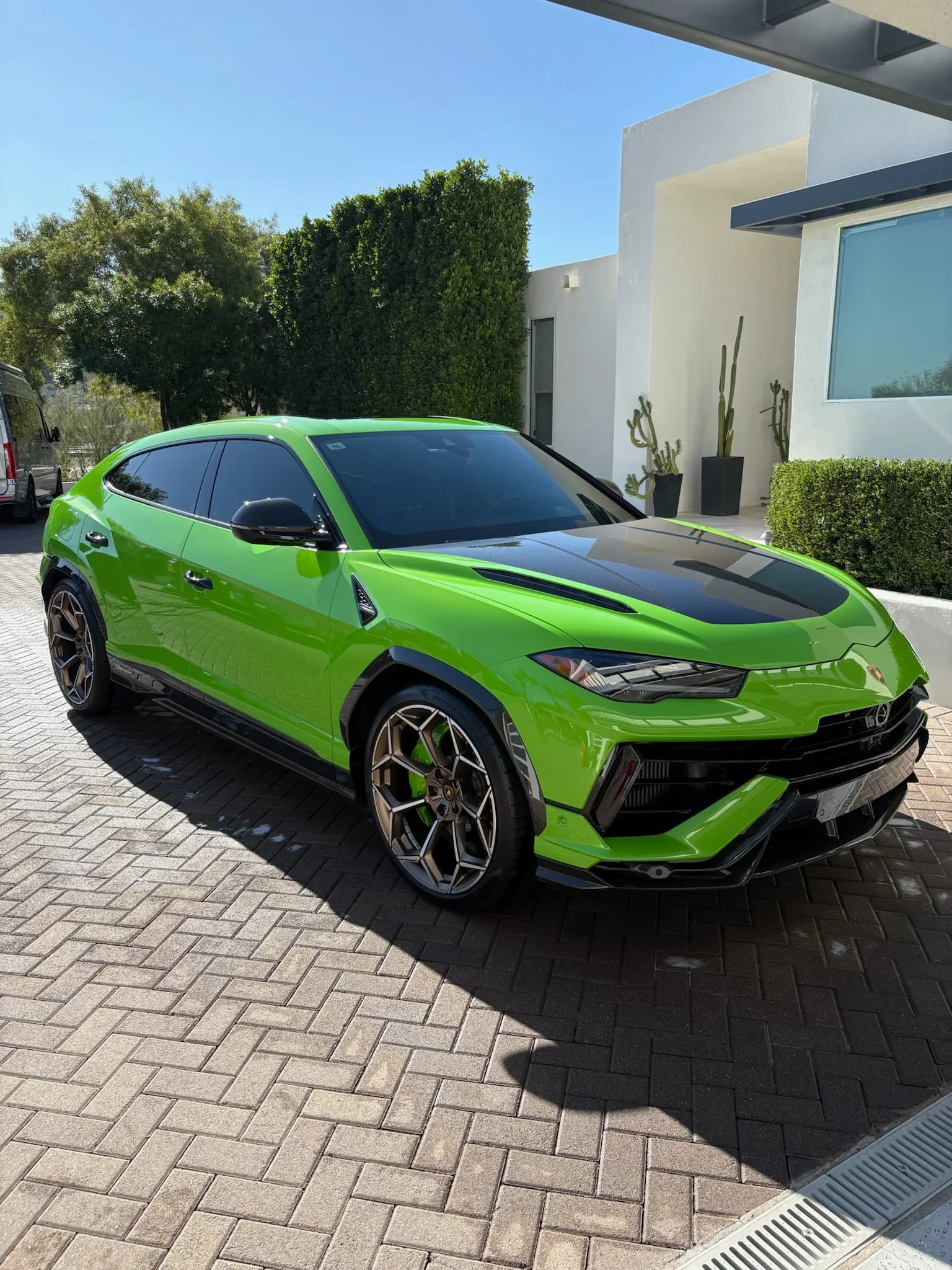Detailed green Lamborghini exterior with a mirror-finish paint surface