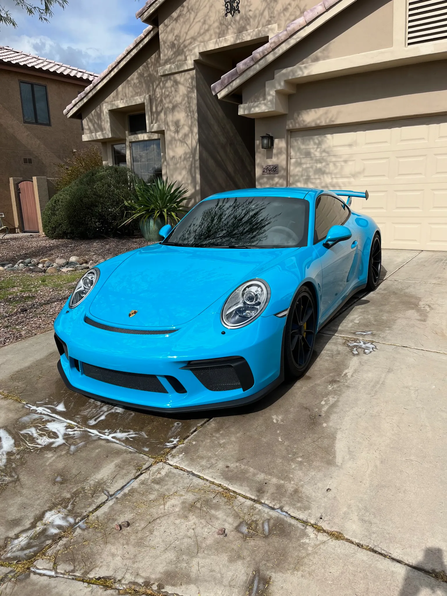 Porsche with paint protection applied across the front-end panels